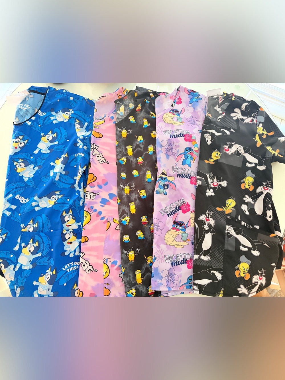 Lot of five medium pediatric scrub tops. Bluey!